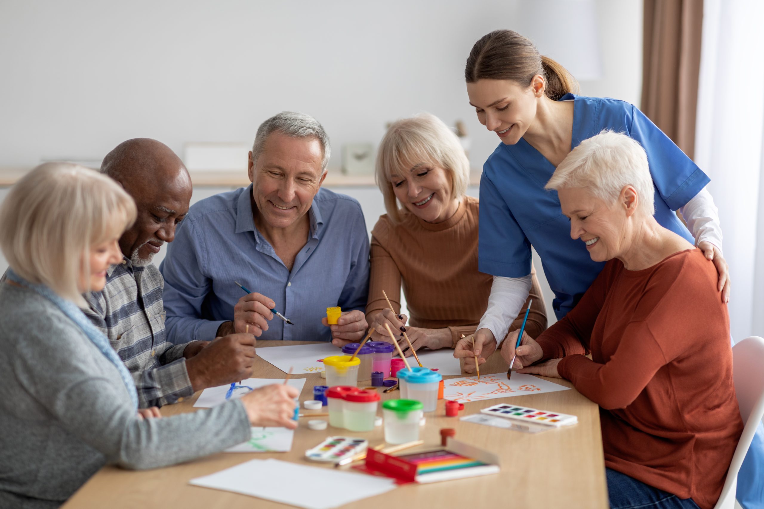 Professional adult day care and senior center environment with engaged participants
