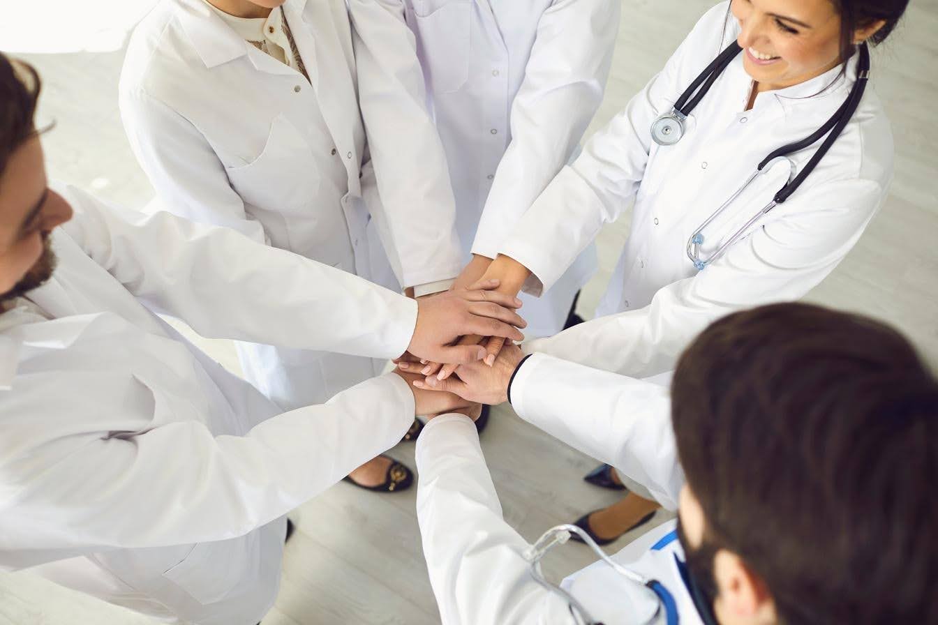 Healthcare compliance team reviewing policies and responsibilities, highlighting how CTK Advisors helps healthcare organizations establish clear accountability and effective compliance oversight.