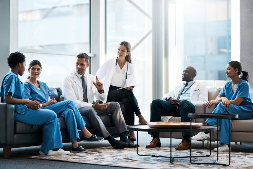 Growing healthcare business team reviewing operational systems and workflows, highlighting how CTK Advisors helps healthcare providers build scalable processes for sustainable growth.
