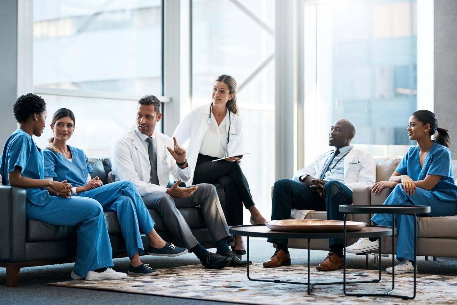 Growing healthcare business team reviewing operational systems and workflows, highlighting how CTK Advisors helps healthcare providers build scalable processes for sustainable growth.